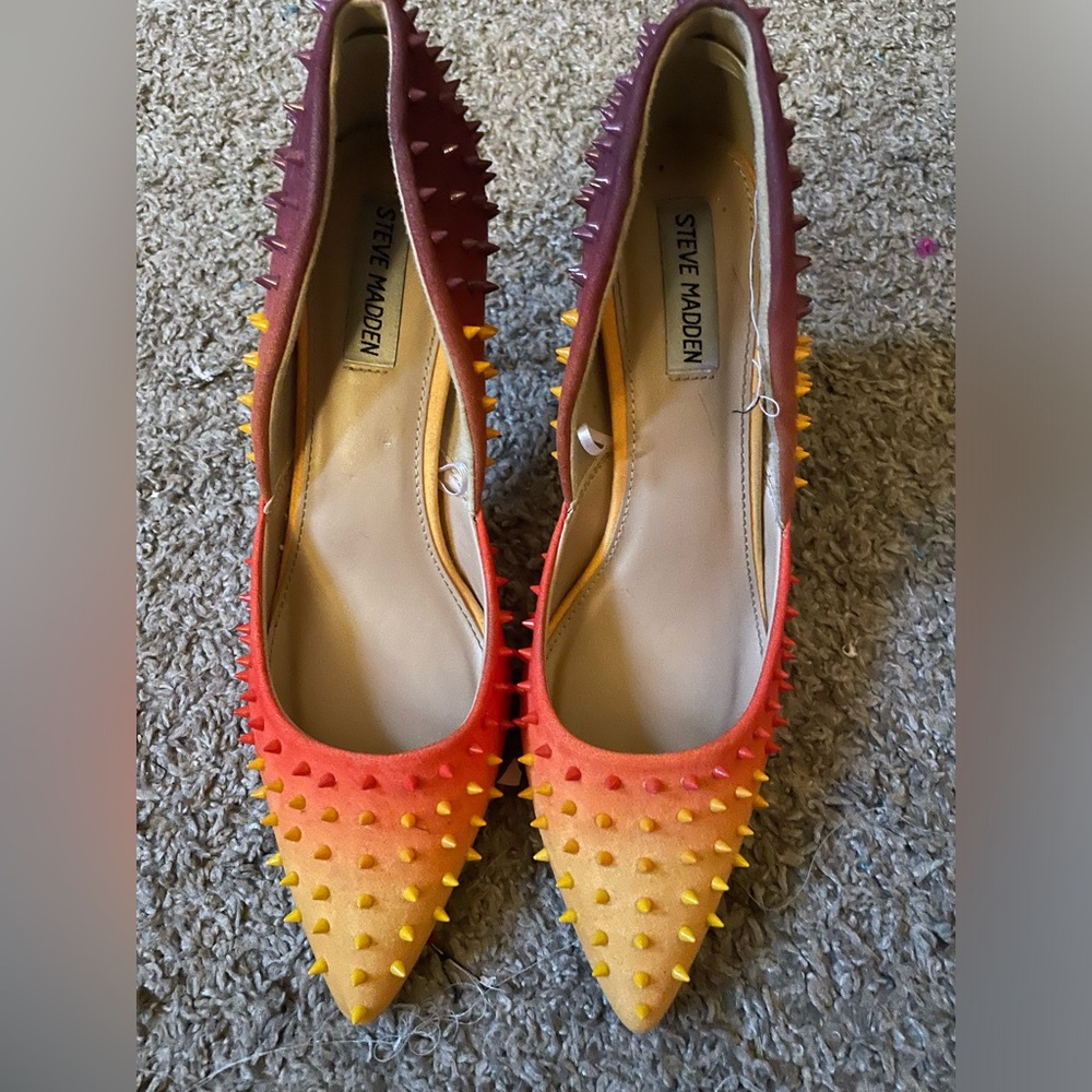 Multi color spike Steve Madden Heels. Very comfortable despite the spikes